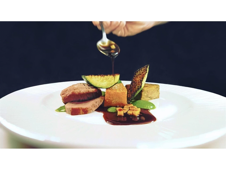 Local lamb served rare, khol rabi, potato darphin, courgette pesto, lamb jus