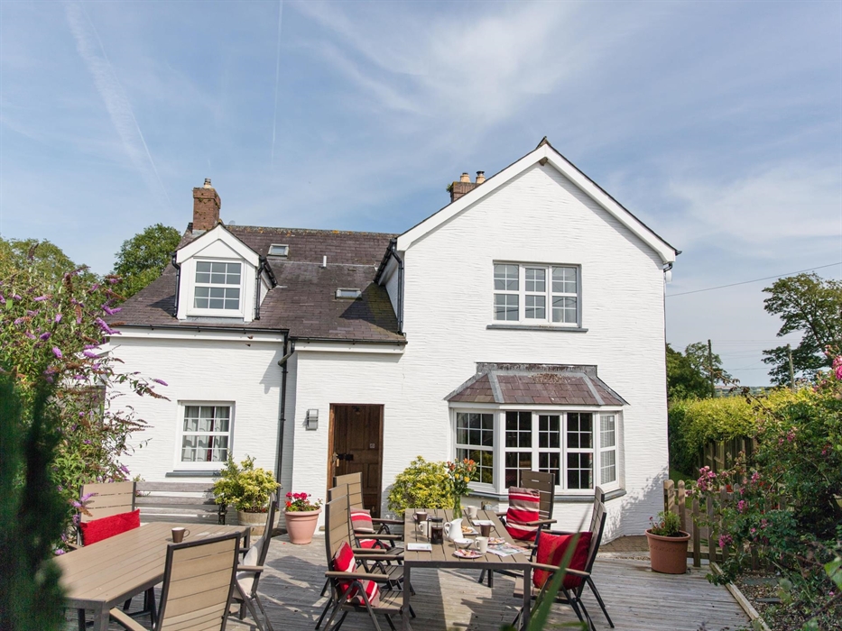 Croft House with it's 6 bedrooms is perfect for multi generational stays or groups. It has it's own large hot tub in the garden. There is a wood burni