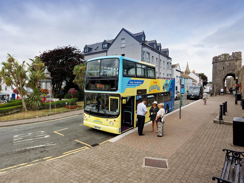 Tenby Coaster Driver with Customers
