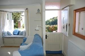 Periwinkle Cottage -interior looking out to bay