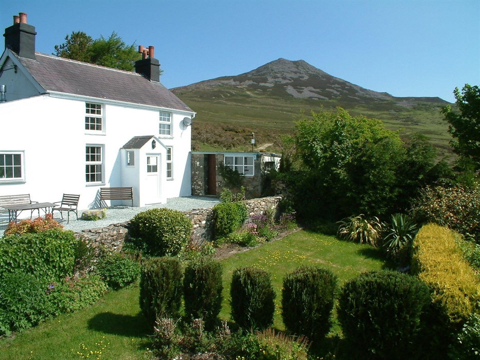 Gors-lwyd Cottage at the foot of Yr Eifl - the highest peak on the Llyn Peninsula