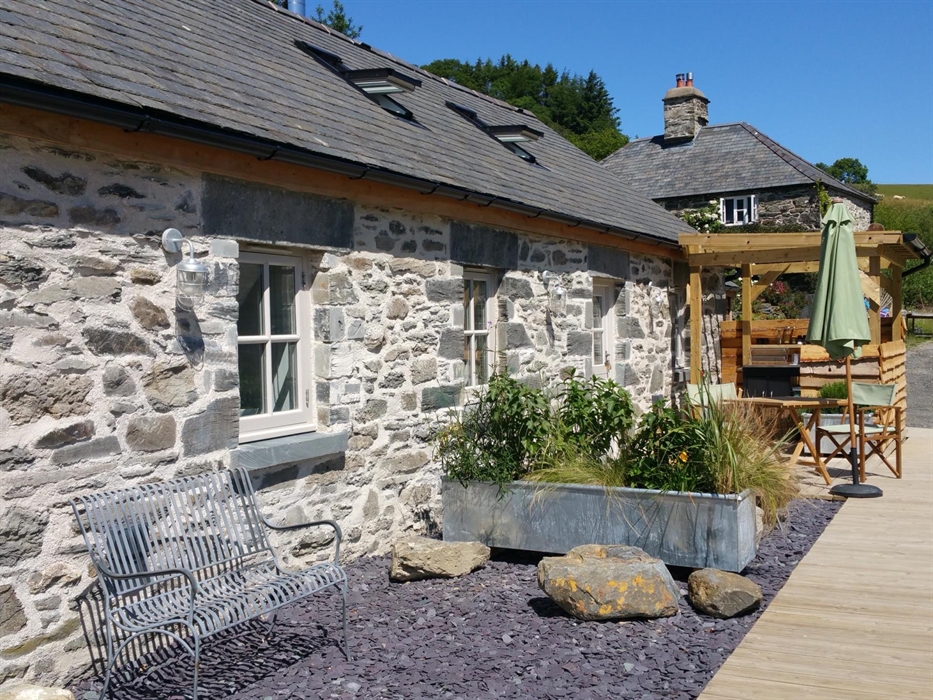 The outside of Star with outdoor seating area and kitchen.