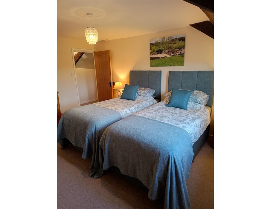 2nd Bedroom with luxurious Zip and Link Beds that configure to two full size Single Beds or one large Super-King Bed