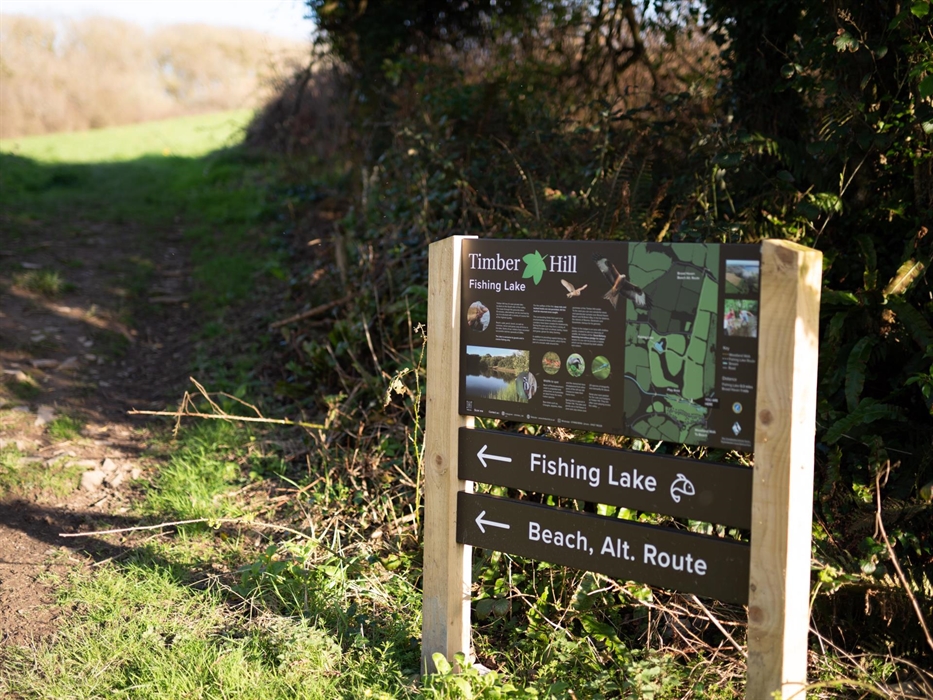 Helpful markers leading explorers through Timber Hill's scenic walking trails.