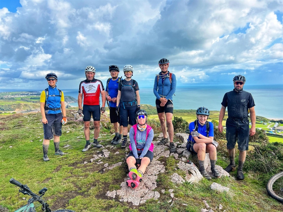 Riders at the end of an epic 6 day crossing of Wales. Gower, South Wales.