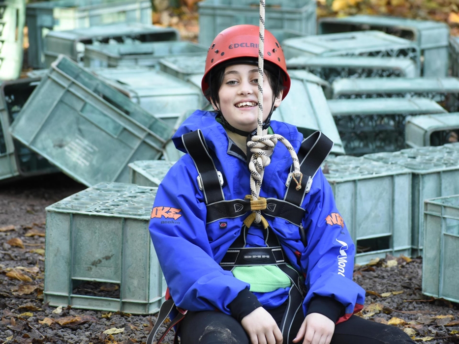 Boy taking part in High ropes exercise