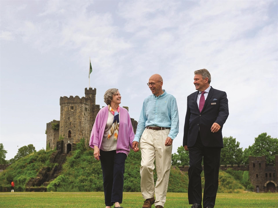CIE Tours' Tour Director, John Cunningham explores the historic Cardiff Caste with guests, highlighting its stunning architecture.