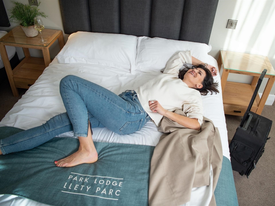 Woman on a Bed at Park Lodge Hotel