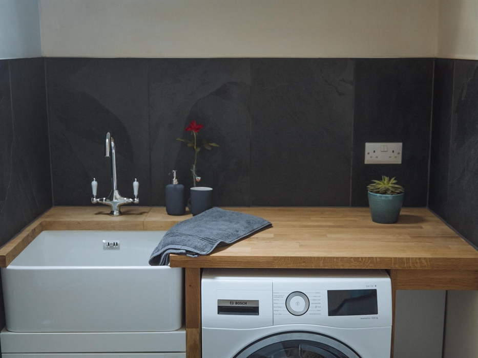 The ensuite/ laundry room