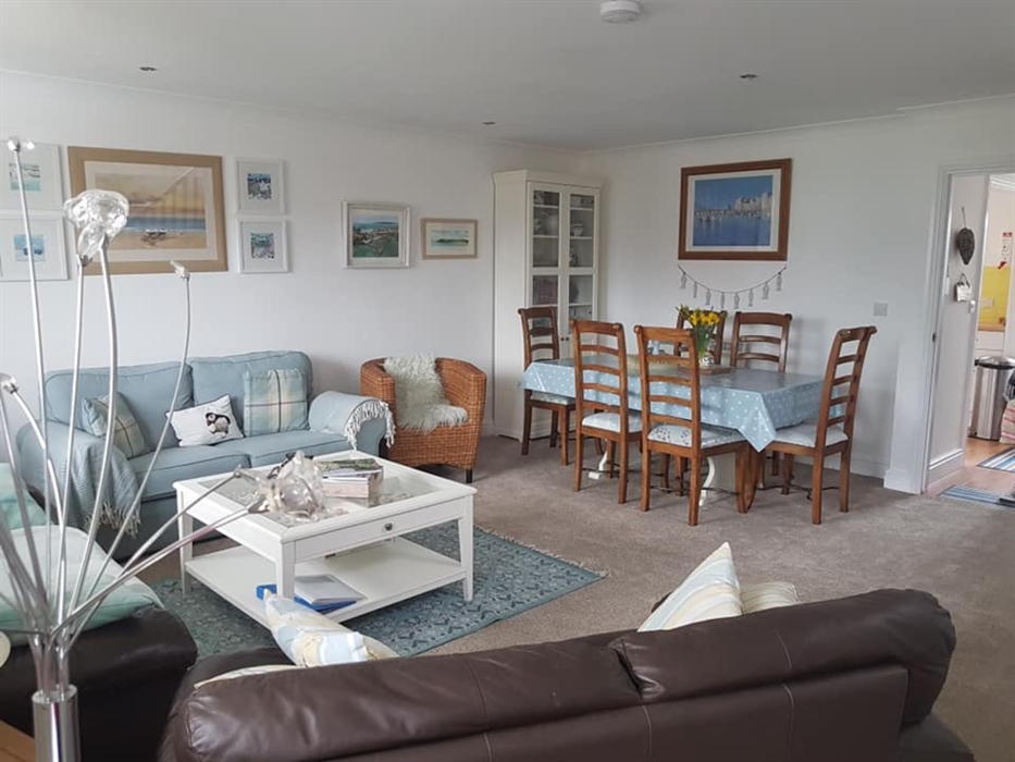 A fresh beach house vibe in the lounge and dining room.  Recycled vintage furniture and some recycled modern pieces too. We love collecting for our wo