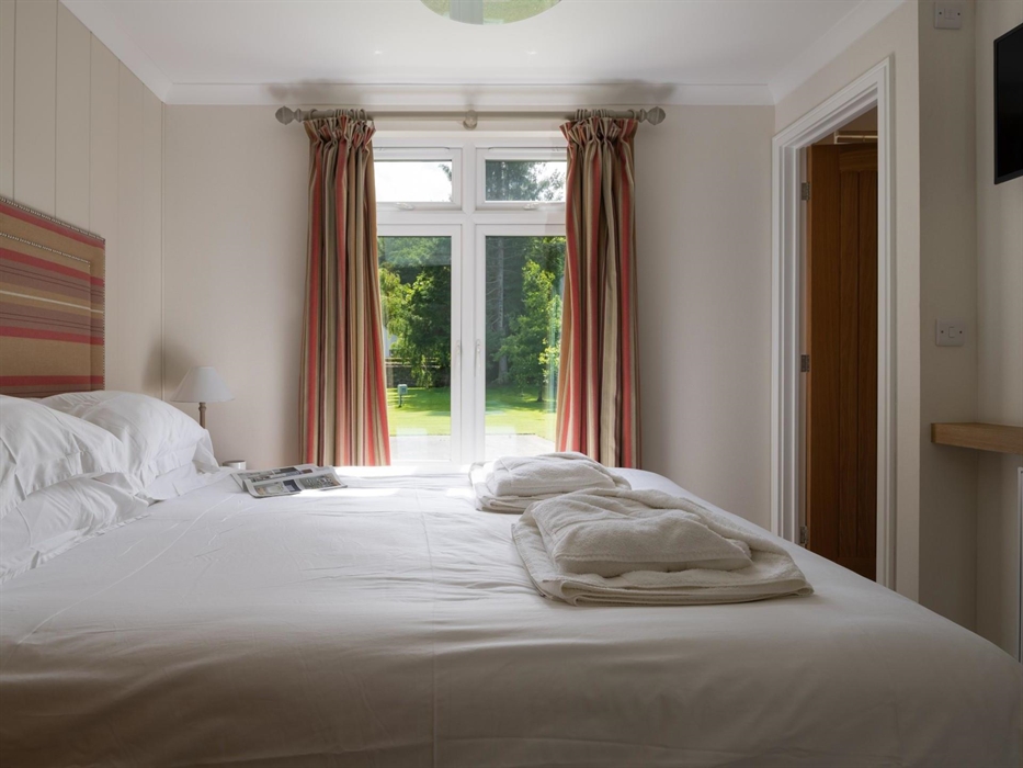 King size bed, with En suite and walk in wardrobe.