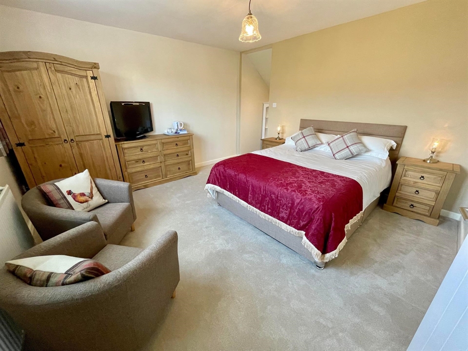 King size bed in a comfortable room