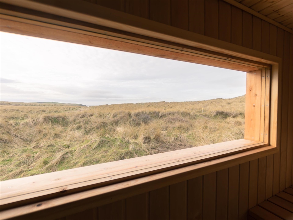 View from sauna room to the dunes