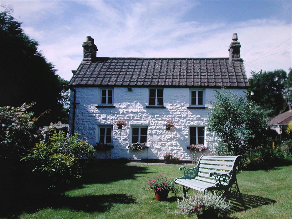 The garden is sheltered and fenced for the safety of children and pets