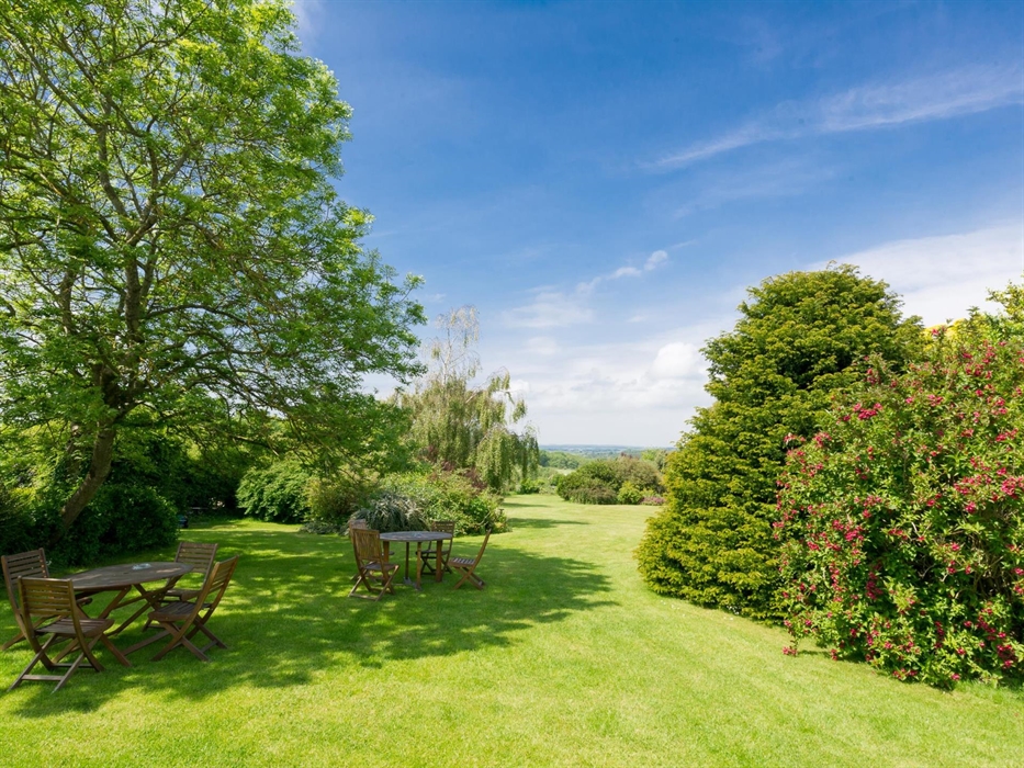 Gardens at Ty'n Rhos country house with views over to the Isle of Anglesey