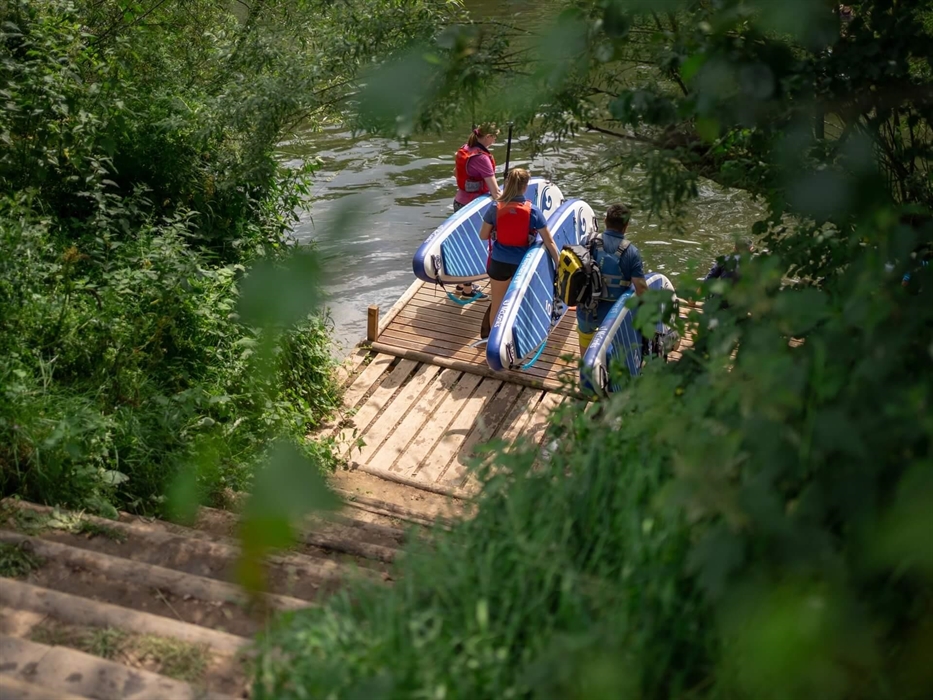 Stand-up paddle boarding at Monmouth South Wales with Inspire2Adventure top things to do near Brecon Beacons