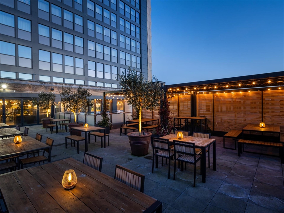 Bar and Kitchen at NP20, Rooftop Terrace at night time with lanterns and fairy lights