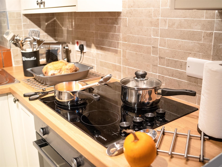 Plenty of work surface and all the pans and utensils you need.  Anything you need that isn't there, just tell us