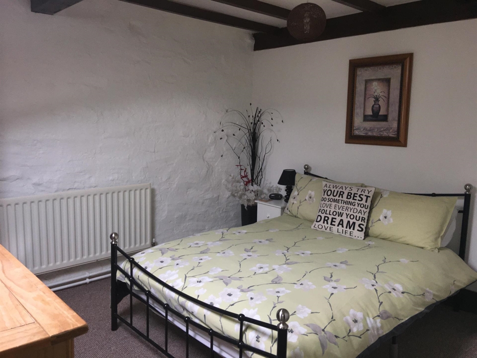 1st double bedroom with wardrobes and chest of draws, large valux window.