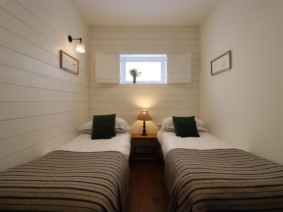 The Pavilion is predominantly a couple’s sanctuary, but has a small twin at the rear of the building, so can sleep four guests. The open plan layout i