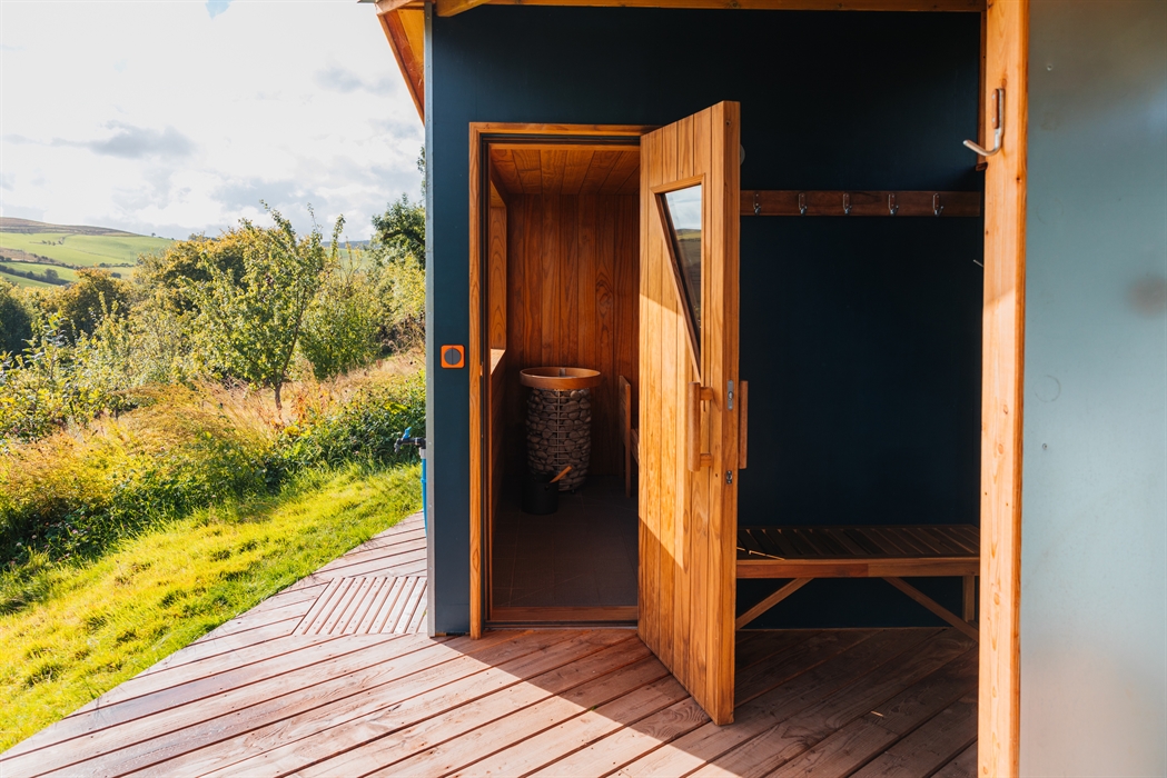 Sauna door open on our wild Welsh hillside