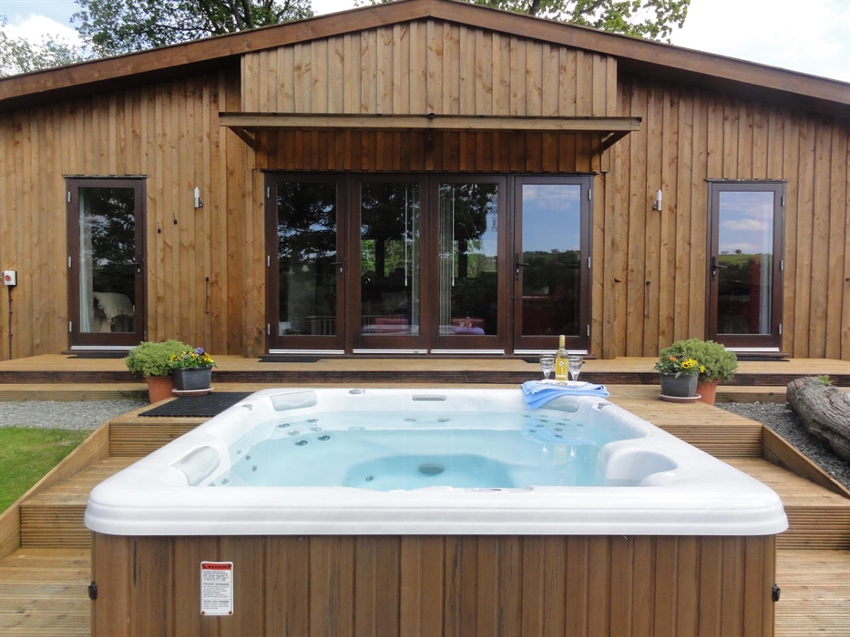 Private spa hot tub located just outside your Lodge.