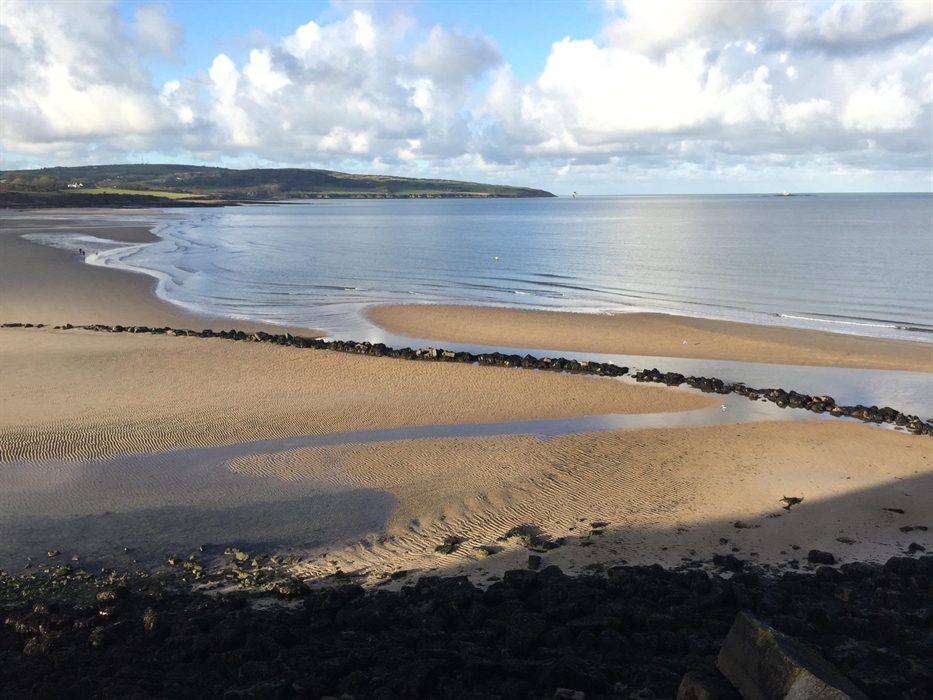 Traeth Lligwy, a beautiful and very popular sandy beach,  flanked by Devonian desert rocks to the north and  Carboniferous rocks (mainly fossiliferous