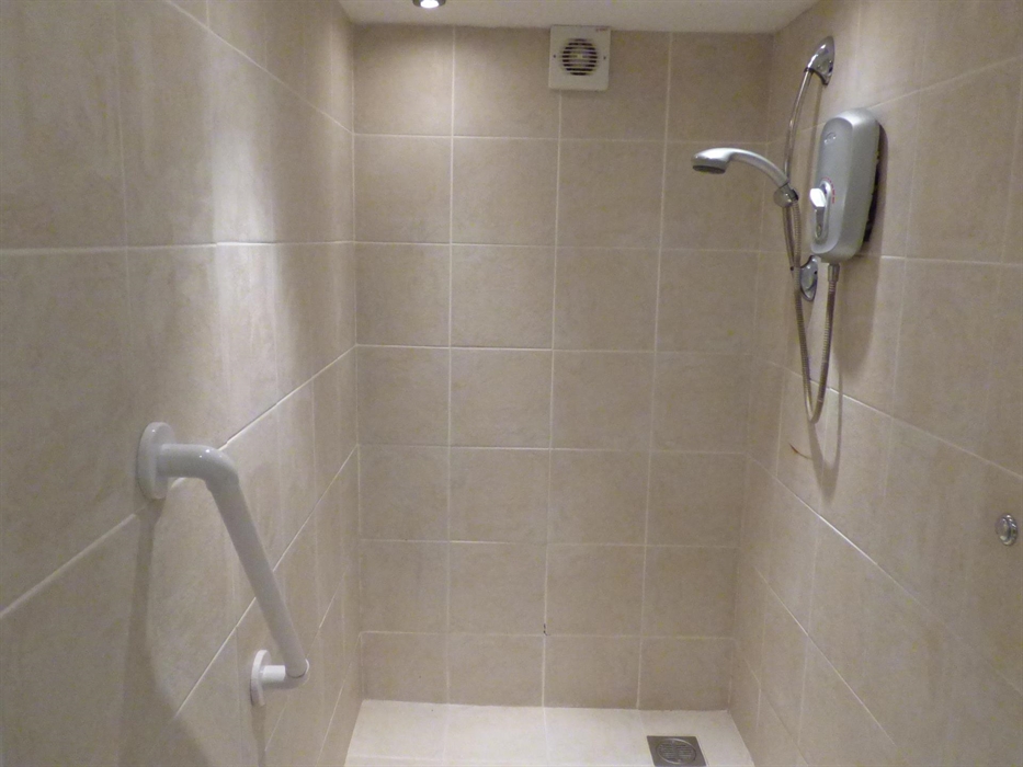 Wetroom at Yr Hal showing shower end.