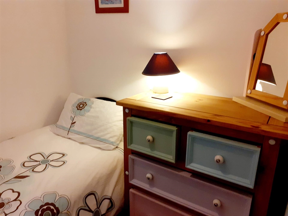 A small room with single bed awaits children, grandparents or friends of the family.