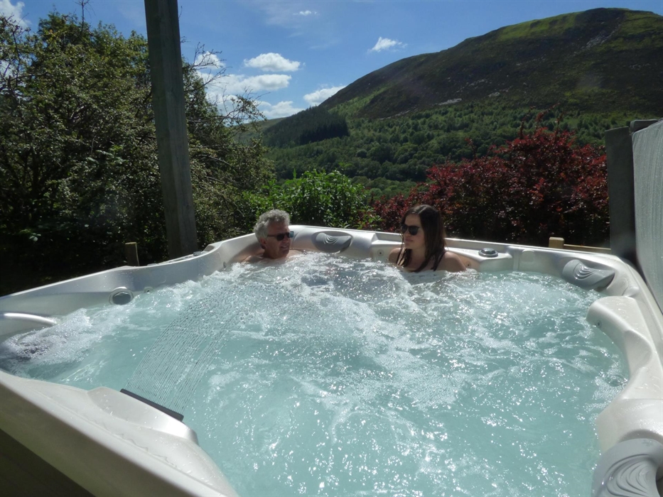 Enjoy stunning views during the day from your secluded hot tub or spend a magical evening under the stars.