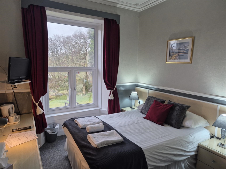 This double room is first floor with tall ceilings and mountain view