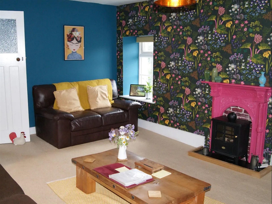 Views to the beacons and the walled garden and orchard. There is sky free view tv, dvd player, 2 sofas, Look alike coal effect convector for cosy look