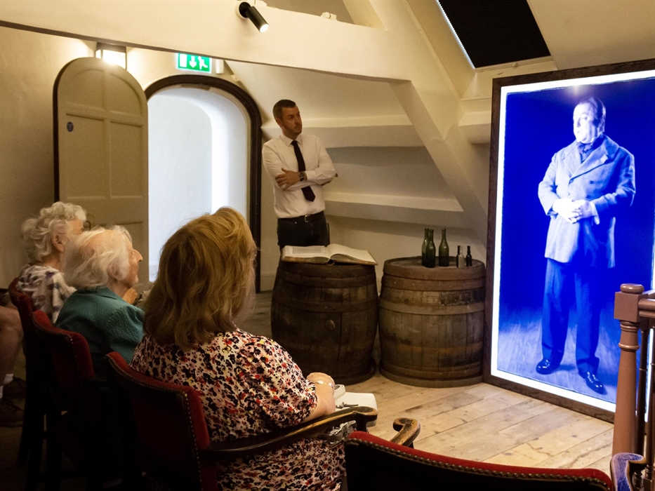 Tour guide presenting the inquest into the death of the young maid, Mira Turner.
