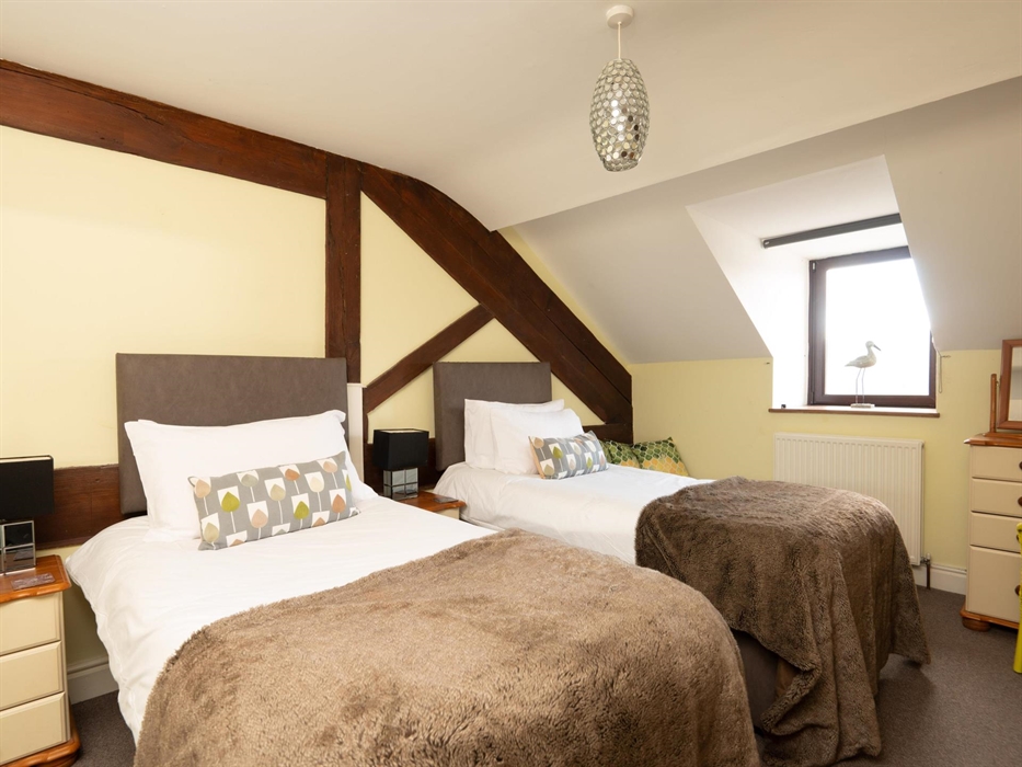 Beds set up as 2 singles in Snowdonia holiday cottage near Barmouth