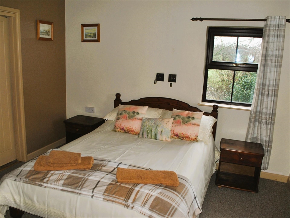 The double bedroom has its own en-suite with spacious and brand new walk is luxury shower. There is plenty of storage and views to two sides.