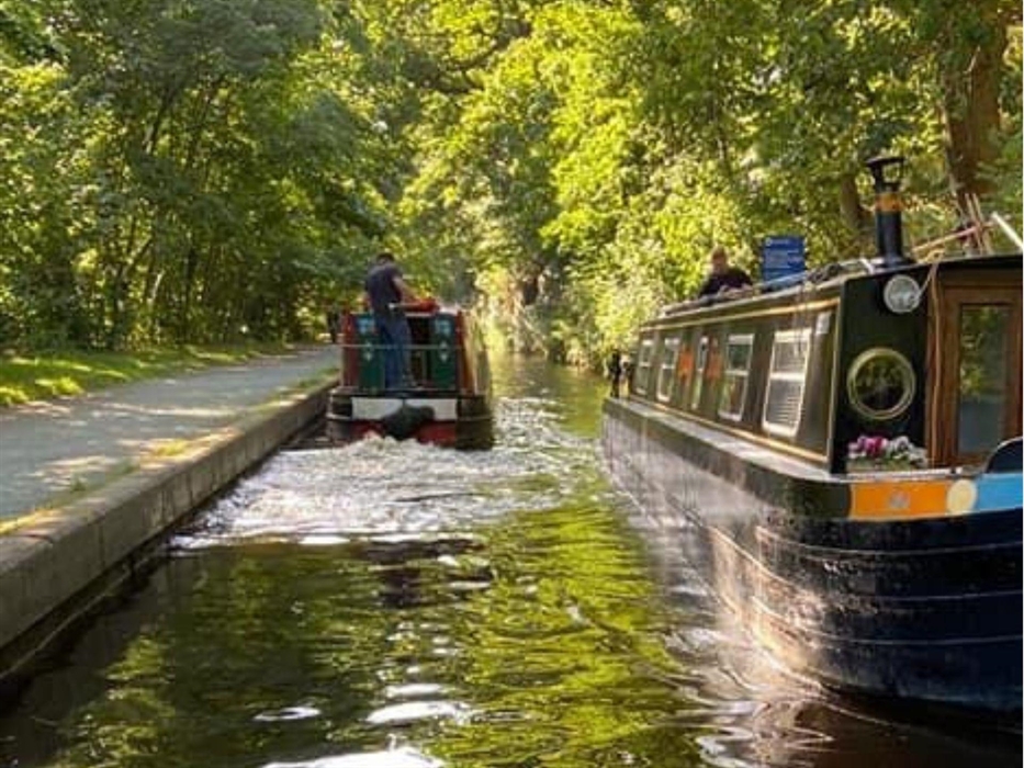 Busy Llangollen Canal Life as boats gently pass by.