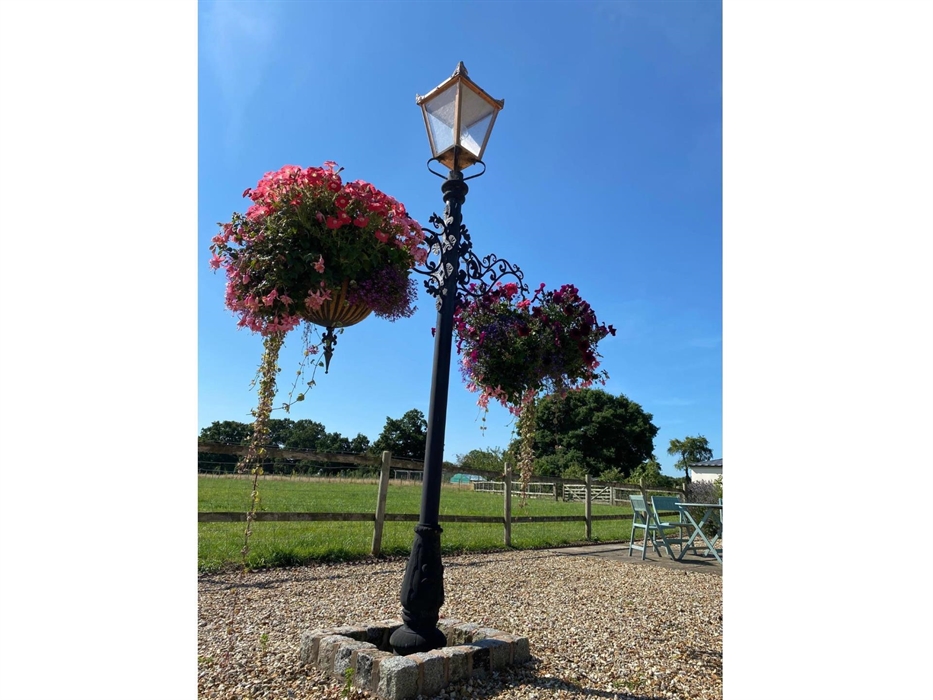 View from Oak cottage over the yard and field