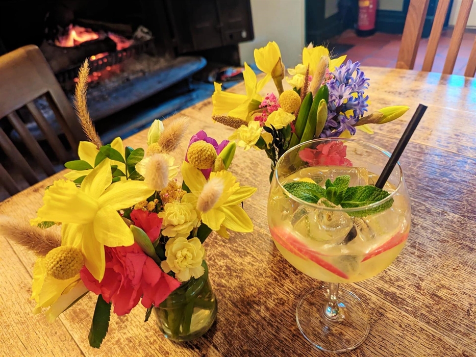 Freshly cut flowers and in house made summery cocktails
