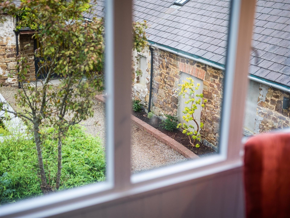 Wake up to morning rays gently illuminating the bedrooms, a peaceful start to a day of exploration.