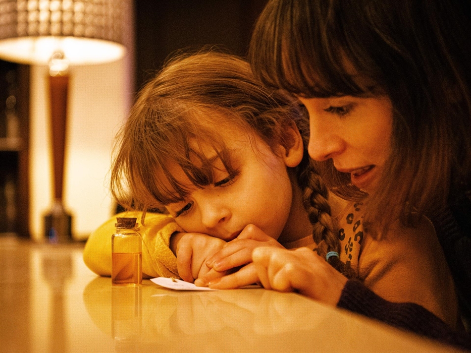 A family team working together to crack a code