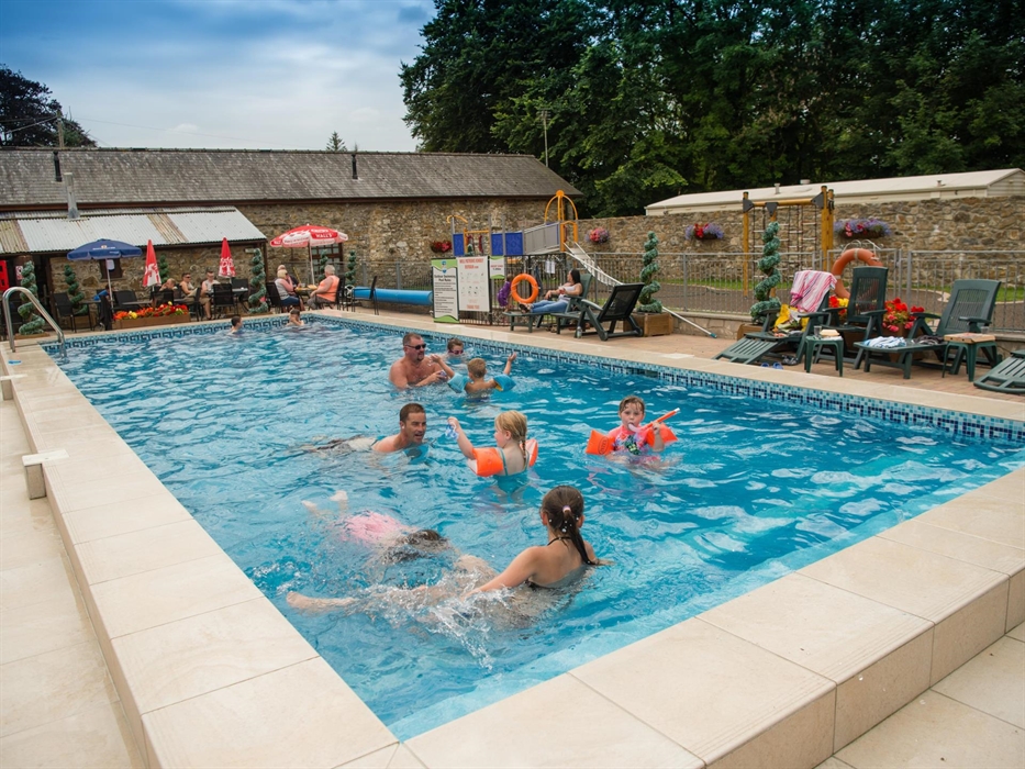 The outdoor swimming pool is open during warmer months at Grondre Holiday Park