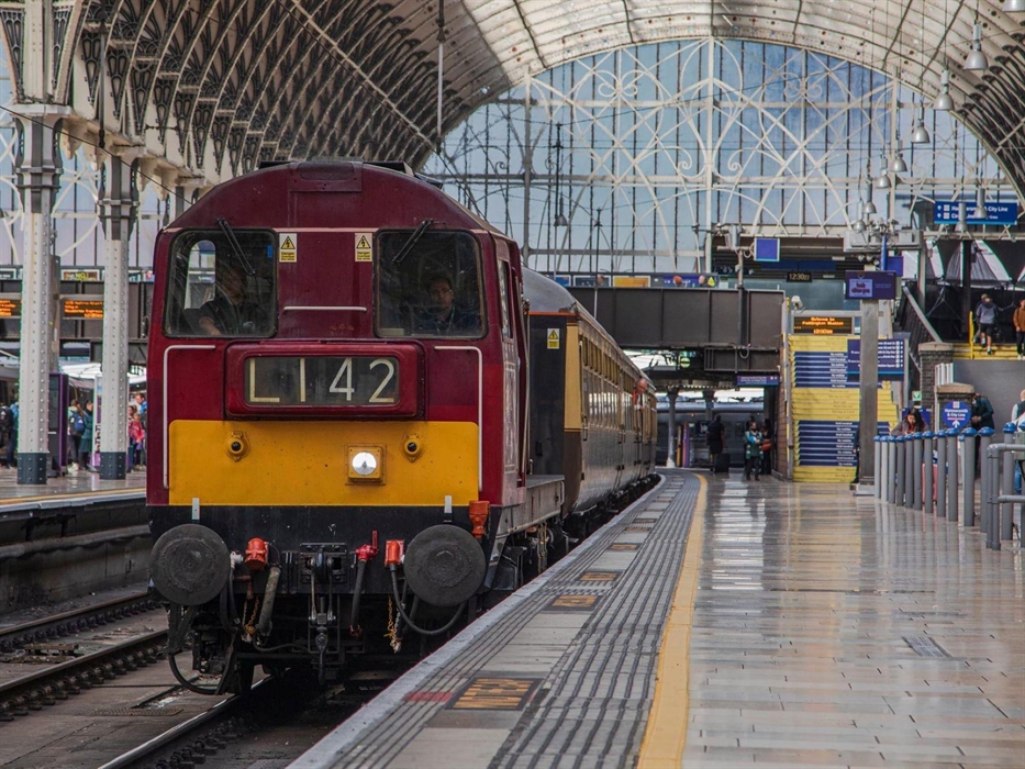 A vintage train at a station