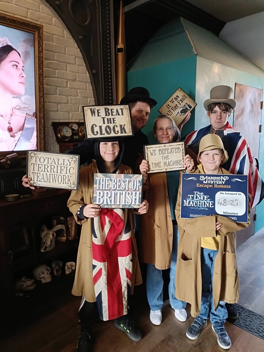 Family of all ages celebrating success at Mansion of Mystery, St Clears.