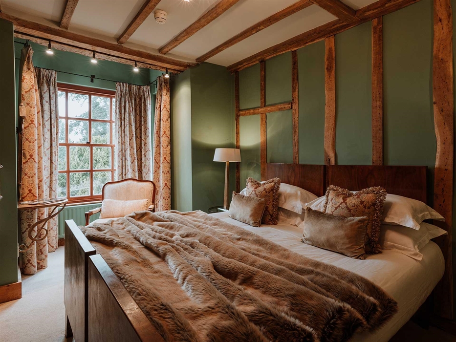 Bedroom Six is on the first floor. It is a room brimming with character, with oak beams and ceiling and now superbly comfortable with a super king-siz