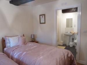 Comfortable 3 ft single beds with an en suite