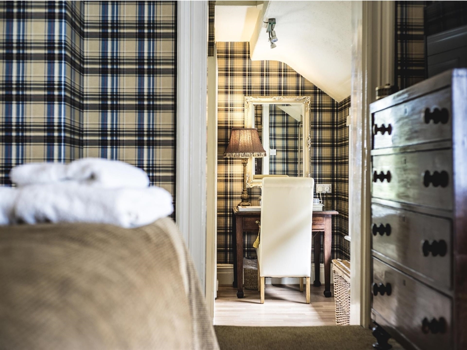 Super King Bed, can be set up as Twin. Shower over bath.