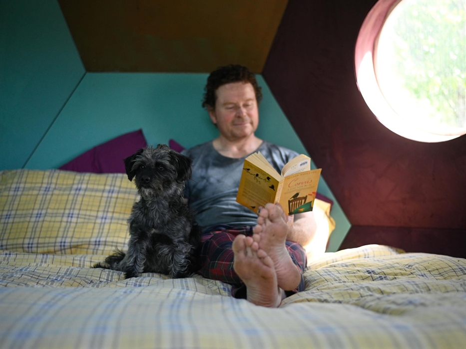 Relaxing in style (the human looks comfy too!)