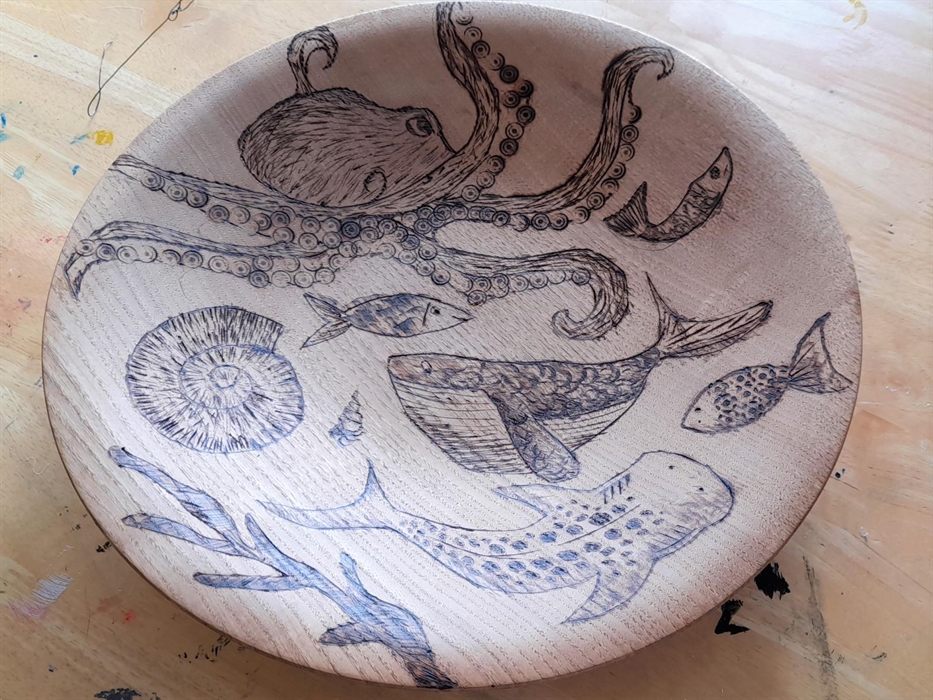 A brilliant piece of pyrography by one of our customers on their first workshop with us, on a rescued wooden plate