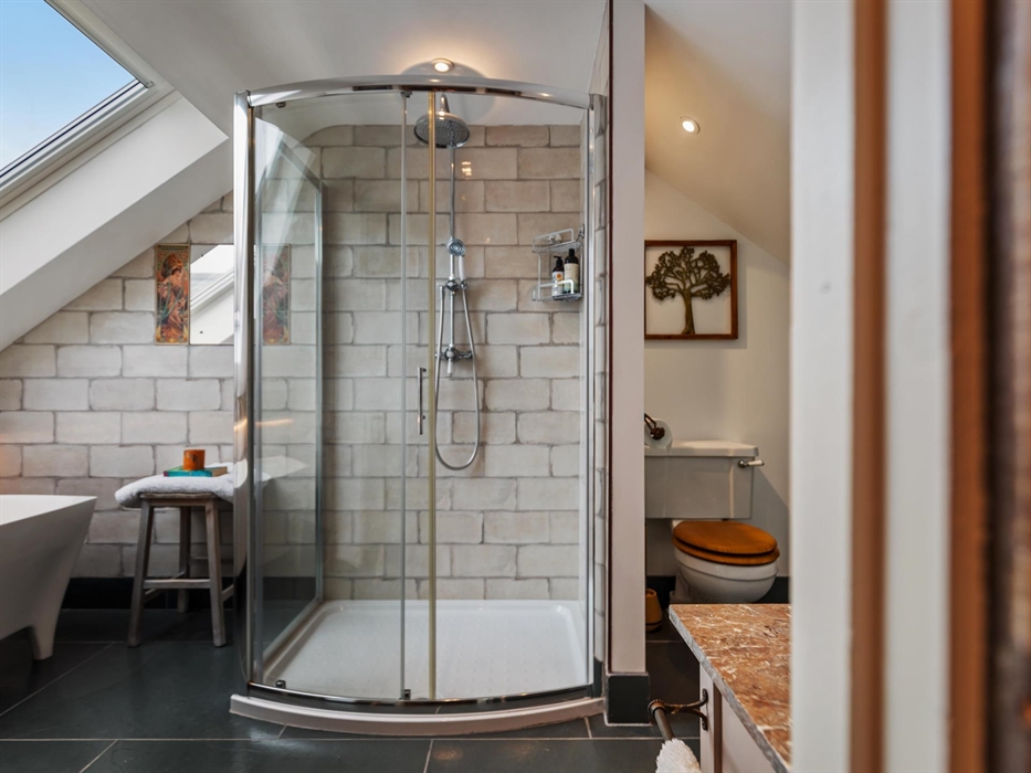 large bowfronted rain shower with hand shower, w.c., period wash stand and large bath, homemade lavender bath bombs, underfloor heating, traditional w