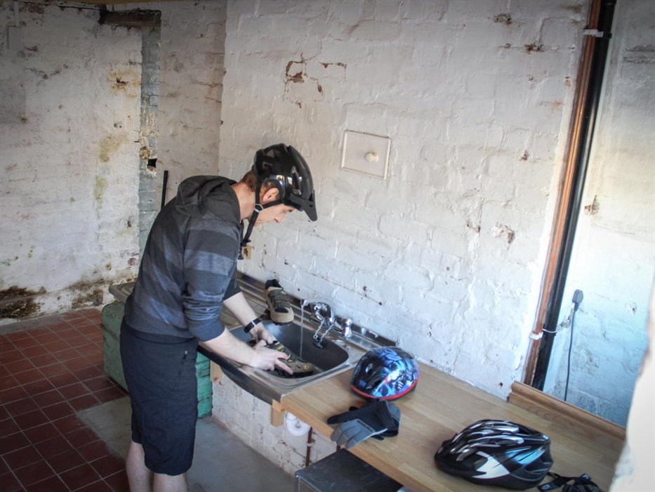 Washroom at Glandwr House, Rhayader - time to clean your bike kit to dry in the dry room